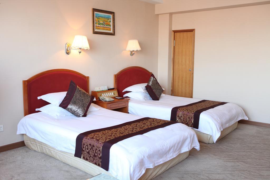 Tianhong Hotel Heze Rum bild