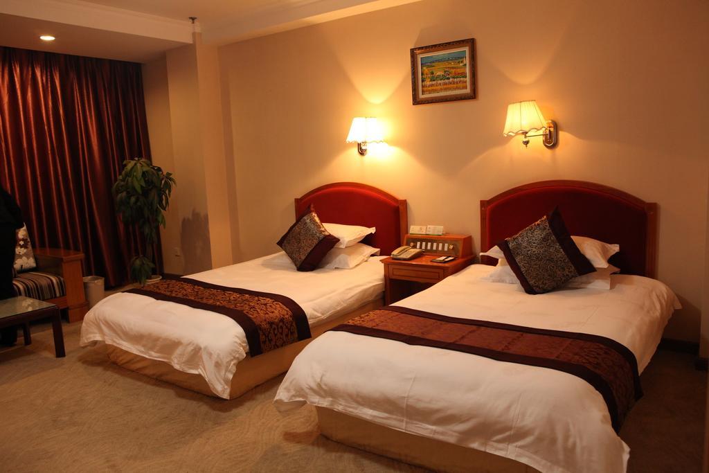Tianhong Hotel Heze Rum bild