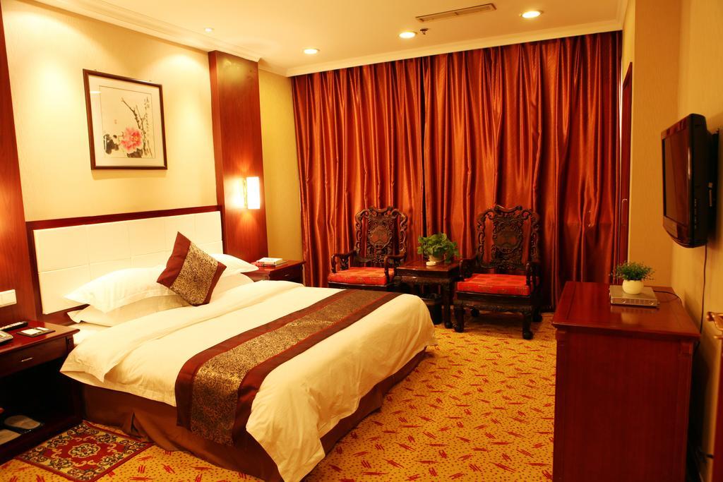 Tianhong Hotel Heze Rum bild