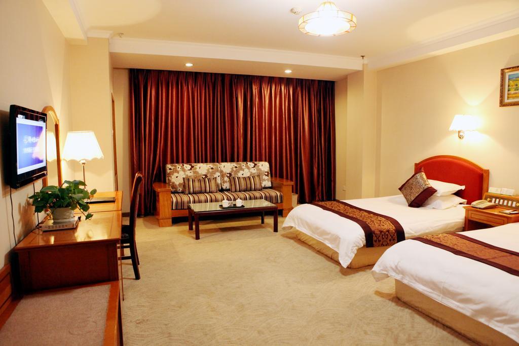 Tianhong Hotel Heze Rum bild